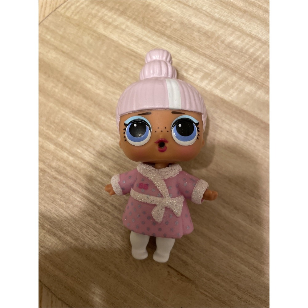 L.O.L. Surprise! Snuggle Babe doll dressed in a cozy pink robe